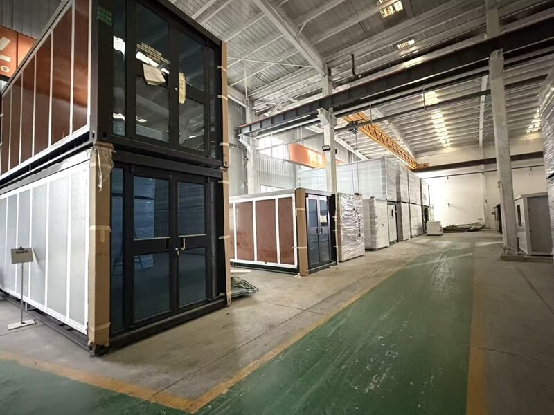 Workshop production of prefab flat pack container house